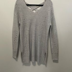 Light gray, almost blueish long sleeve light sweater. Never worn.